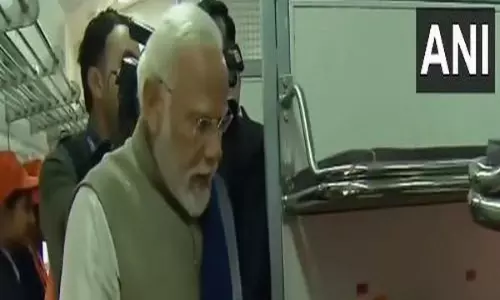 PM Modi arrives at Ayodhyas Maharishi Valmiki International Airport to inaugurate it