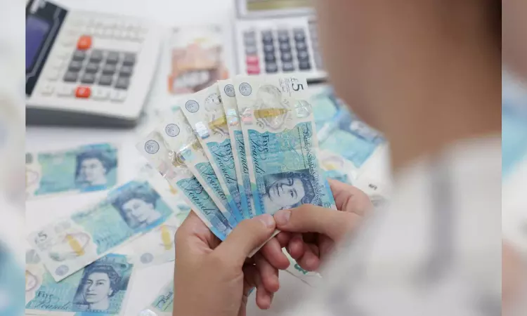 Sterling slips but remains close to 5-month high