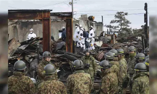213 deaths were caused by Japans New Years quake. 8 happened in alleged safety of shelters