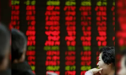 China stocks rise as investors await GDP data; HK shares fall