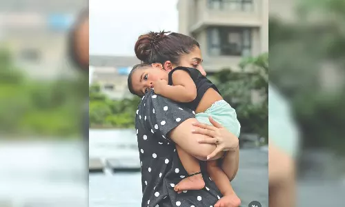 Nayanthara shares pictures with sons Uyir and Ulagam