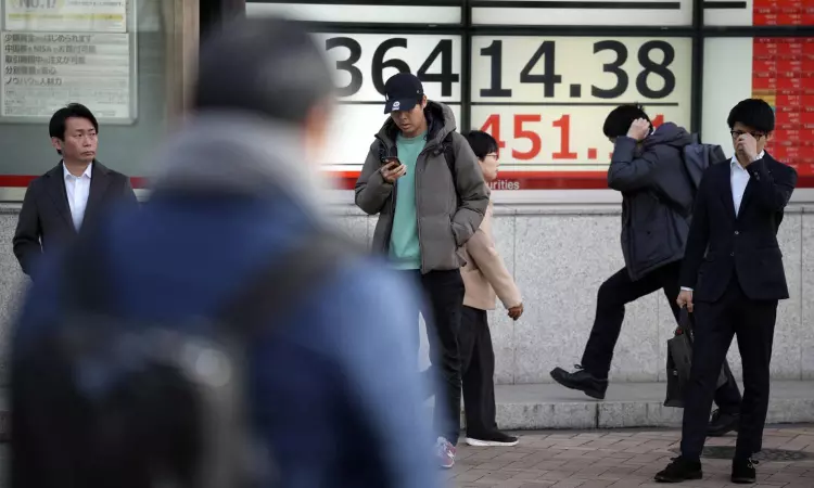 Stock market today: Asian shares follow Wall Street gains, Hong Kong stocks near 15-month low