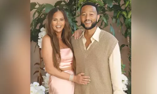 Chrissy Teigen says John Legend was jealous of Carl Radke