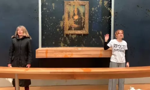 French farmers aim to put Paris ‘under siege’ in tractor protest. Activists hurl soup at ‘Mona Lisa’