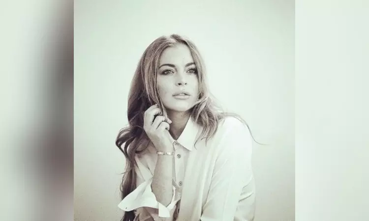 Lindsay Lohan takes a stroll with husband, newborn amid shooting