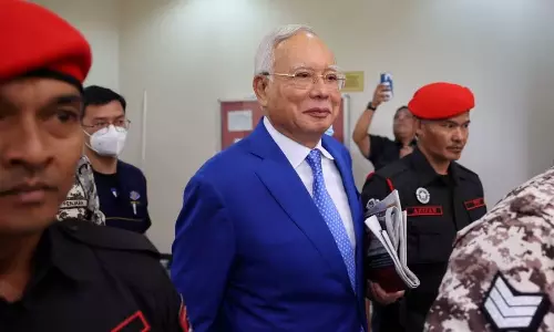 Malaysia pardons panel halves jail sentence of ex-PM Najib