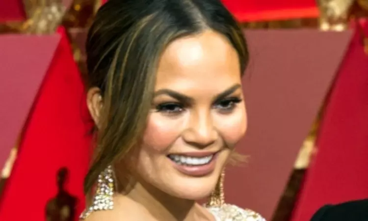 Chrissy Teigen says she lets her mind wander during sex with husband John Legend