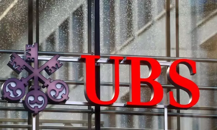 UBS plans to restart share buybacks, logs Q4 loss