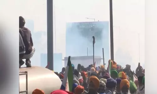 Police fire tear gas at farmers gathered at Punjab-Haryana Shambhu border