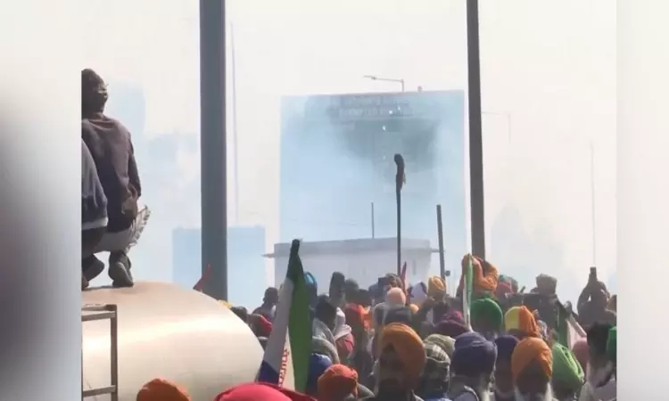 Police fire tear gas at farmers gathered at Punjab-Haryana Shambhu border