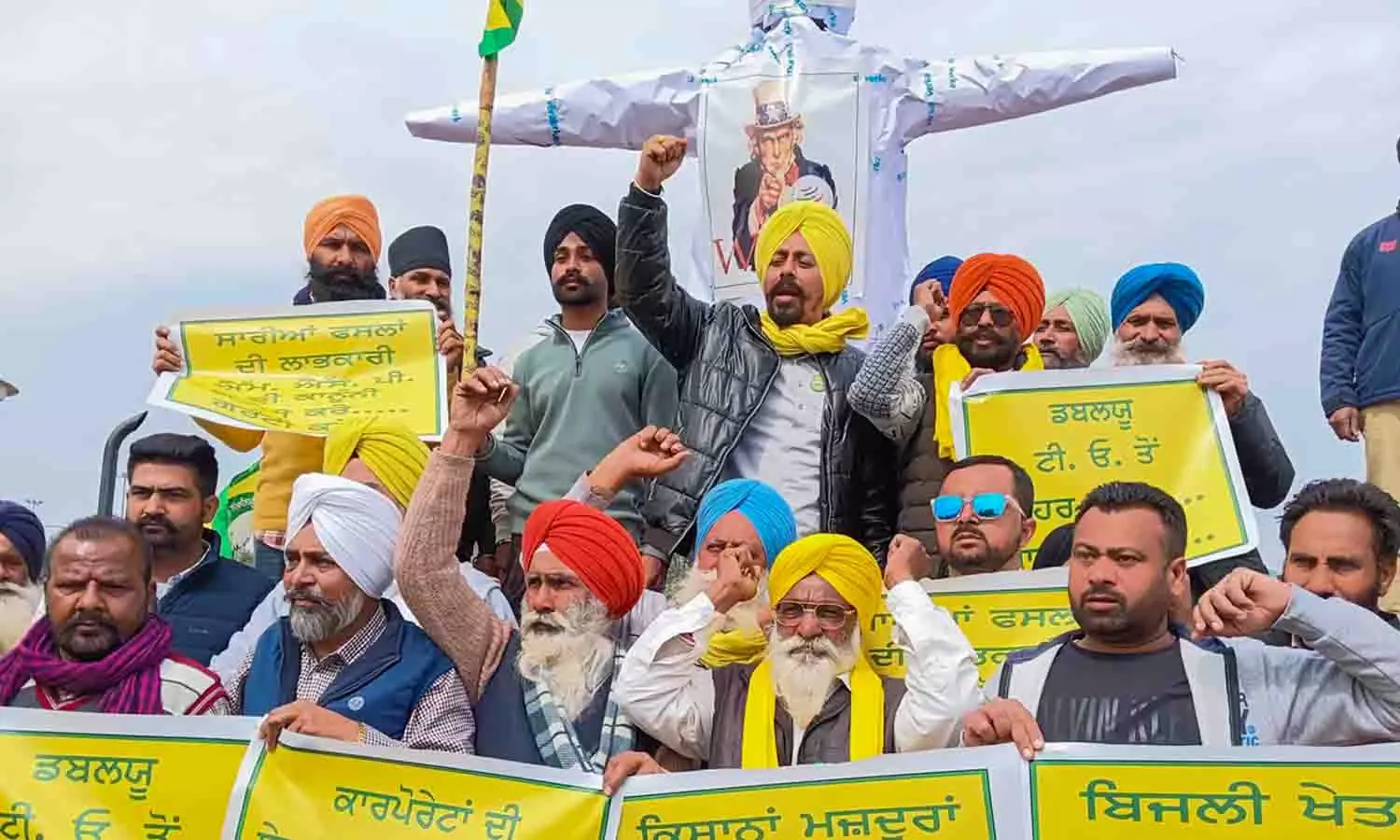 Farmers camping at Punjab-Haryana border burn effigies protesting WTO