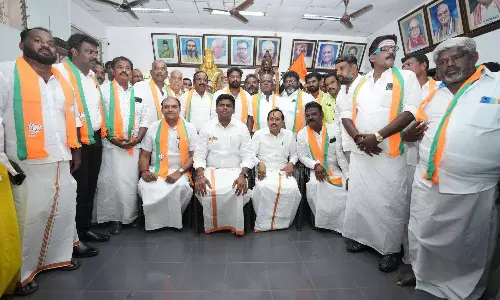 Rajinikanths fan club members join BJP