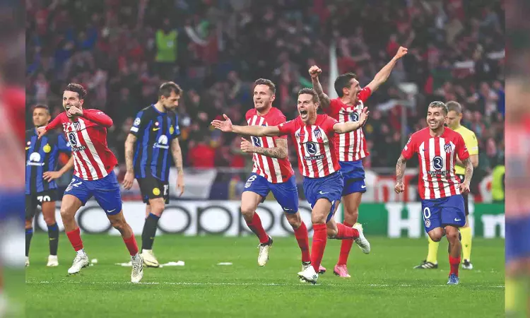 Atletico knocks out Milan on penalties to reach quarter-final Atletico knocks out Milan on penalties to reach quarter-final