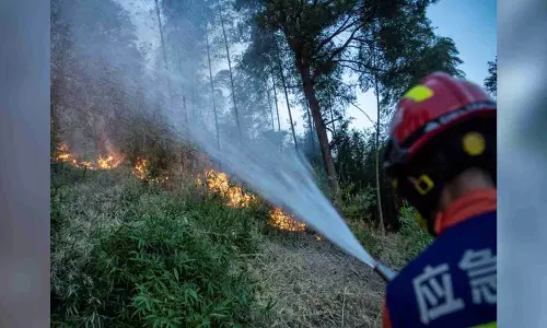 China activates Level-IV emergency as rescuers battle wildfires in Chinas Sichuan