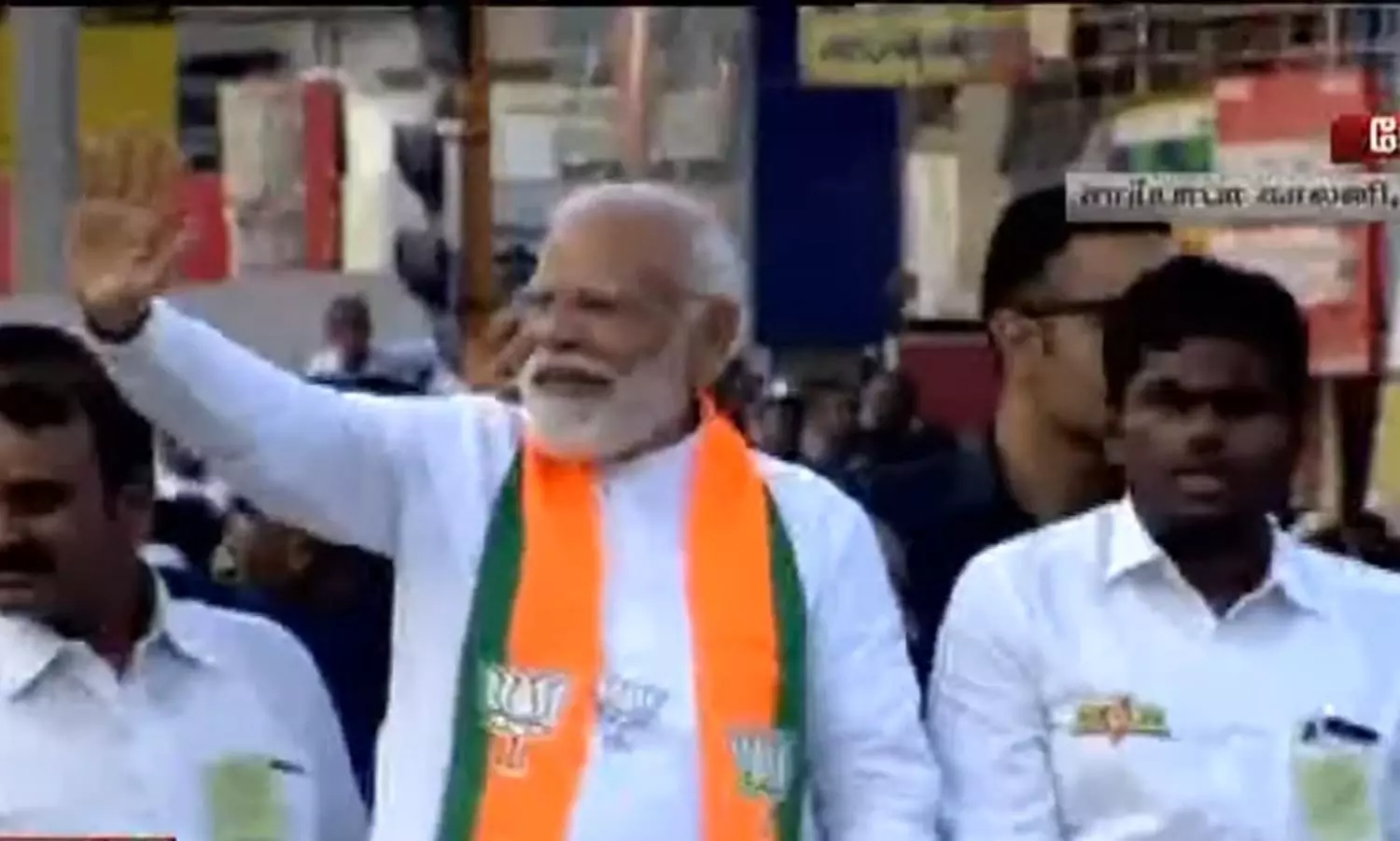 PM Modi is accompanied by TN BJP Chief K.... ... PM Roadshow in Coimbatore live: BJP party-men chant slogans hailing Modi PM Modi is accompanied by TN BJP Chief K.... ... PM Roadshow in Coimbatore live: BJP party-men chant slogans hailing Modi