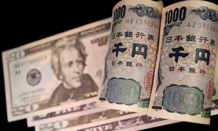 Yen falls close to intervention levels, dollar edges up before Fed