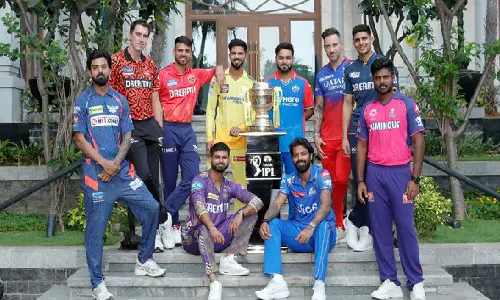 Team captains pose with trophy ahead of IPL season
