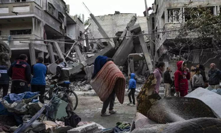 Palestinians describe bodies and ambulances crushed in Israel’s ongoing raid around Gaza hospital