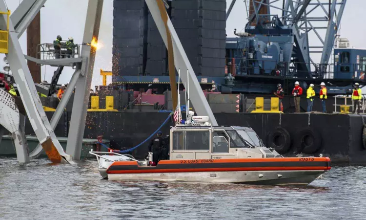 Crews at Baltimore bridge collapse continue meticulous work of removing twisted steel and concrete
