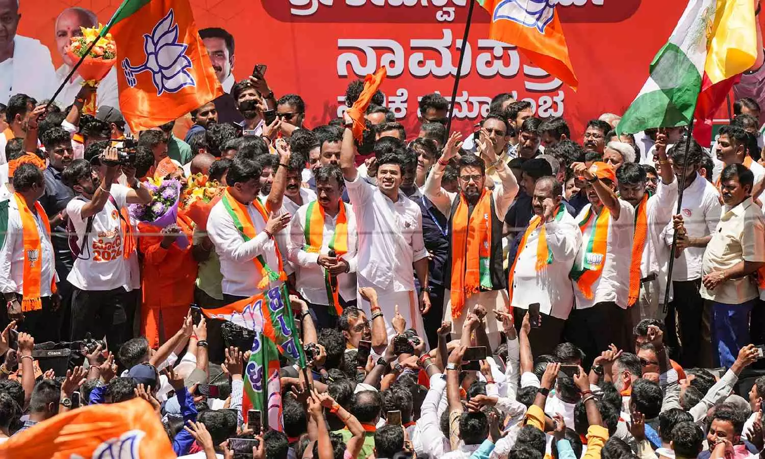 Former CM Kumaraswamy, BJP MP Tejasvi Surya file nominations for LS polls Former CM Kumaraswamy, BJP MP Tejasvi Surya file nominations for LS polls