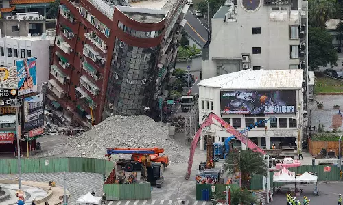 Taiwan earthquake rescuers face threat of landslides, rockfalls as death toll at 12