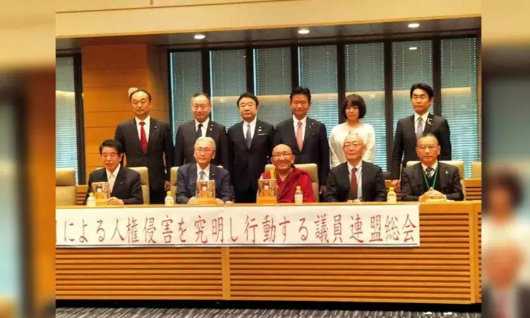 Eminent Buddhist teacher Arjia Rinpoche gives first-hand information about Chinas atrocities to Japanese lawmakers