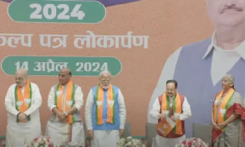 PM Modi releases BJPs LS poll manifesto with special focus on poor, youth, farmers, women