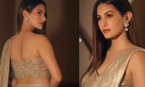 Amyra Dastur shimmers in a golden saree Amyra Dastur shimmers in a golden saree