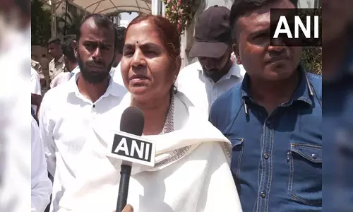 We believe Congress govt will reinvestigate says Rohith Vemulas family