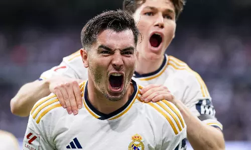 Real Madrid wins its record-extending 36th Spanish league title after Barcelona loses at Girona