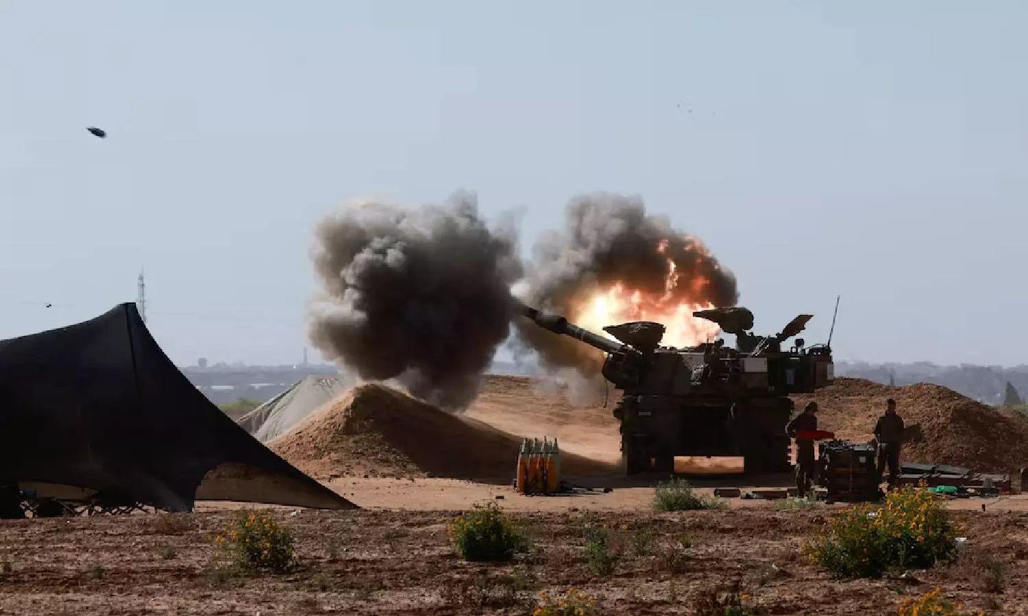 Battles rage around Rafah after U.S. halts some weapons to Israel