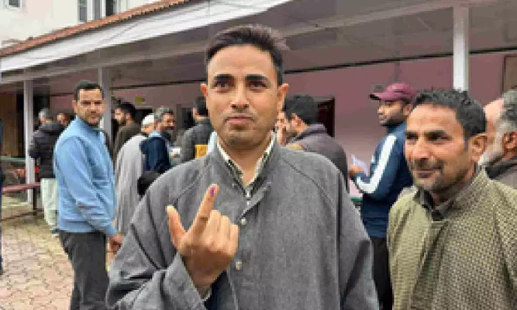 Enthusiastic voters line up outside polling stations in J&Ks Srinagar LS seat