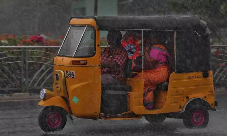 A visual of people travelling in the rains in Chennai. (Photo | Justin George/DT Next) A visual of people travelling in the rains in Chennai. (Photo | Justin George/DT Next)