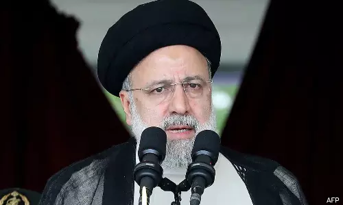 Iran honors fallen President Raisi with Reverent burial at holy site