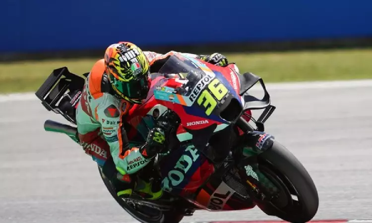 Repsol Honda Team battle track conditions in Catalan sprint