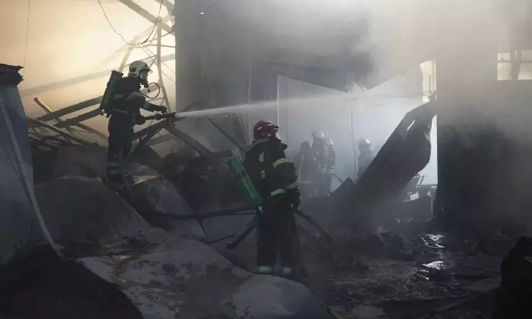 The death toll in Kharkiv attack rises to 14 as Zelenskyy warns of Russian troop movements