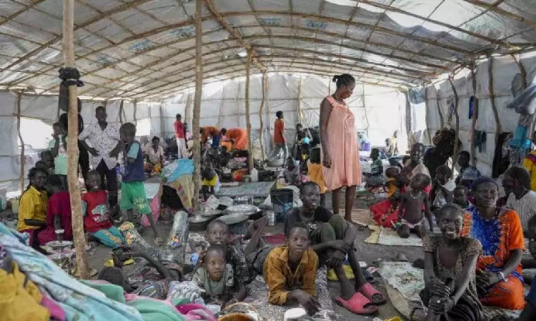 Aid group says over 100 people killed in 2 weeks of fighting in a Sudanese city Aid group says over 100 people killed in 2 weeks of fighting in a Sudanese city