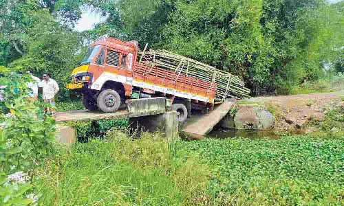 Channel bridge collapses under weight of loaded lorry in Thanjavur Channel bridge collapses under weight of loaded lorry in Thanjavur