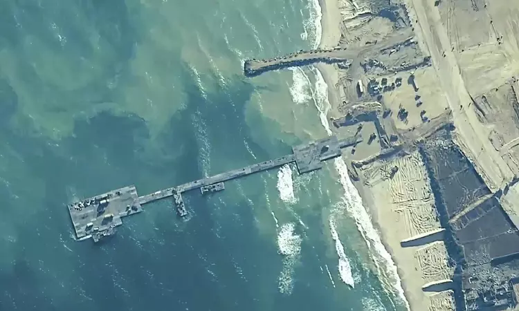 UN food agency pauses its aid work at US pier in Gaza over security concerns in latest setback