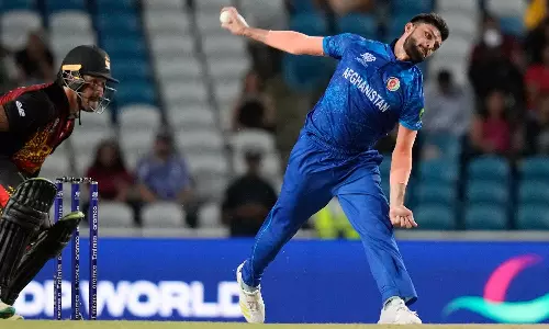 Fantastic Farooqi seals Afghanistans maiden Super Eight berth with rout of PNG