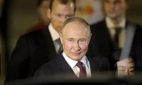 Russia hands an 8-year prison term to a newspaper publisher in Siberia over Ukraine war criticism