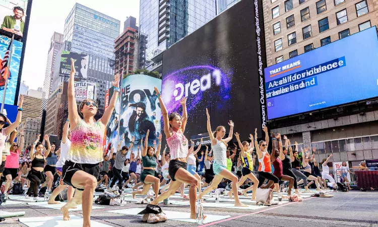 Consulate General of India in New York leads Yoga session at Times Square Consulate General of India in New York leads Yoga session at Times Square