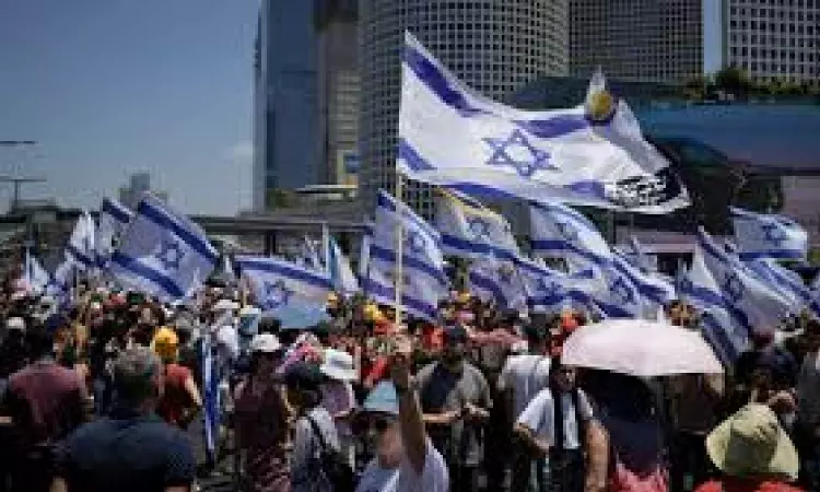 Israeli protesters block highways, call for cease-fire to return hostages 9 months into war in Gaza Israeli protesters block highways, call for cease-fire to return hostages 9 months into war in Gaza