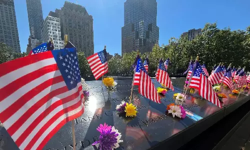 US commemorates 9/11 attacks with victims in focus, but politics in view