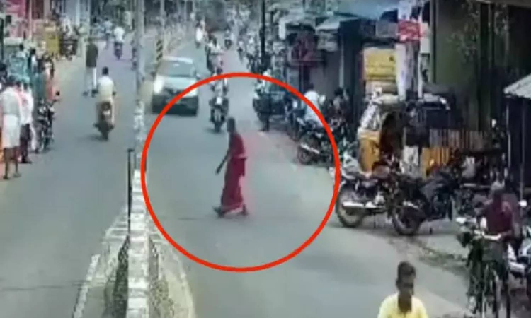 Tiruvannamalai: CCTV shows elderly woman being hit by speeding car, thrown few feet away Tiruvannamalai: CCTV shows elderly woman being hit by speeding car, thrown few feet away
