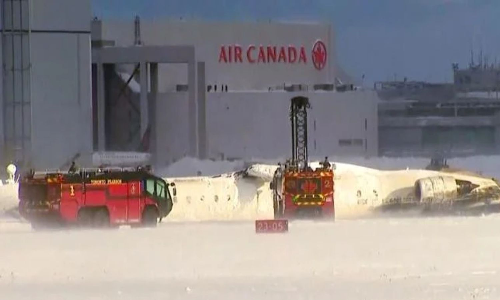 Delta Airlines plane flips on landing in Toronto, badly hurt child among eight casualties