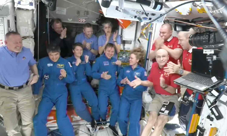 NASAs stuck astronauts welcome their newly arrived replacements to space station NASAs stuck astronauts welcome their newly arrived replacements to space station