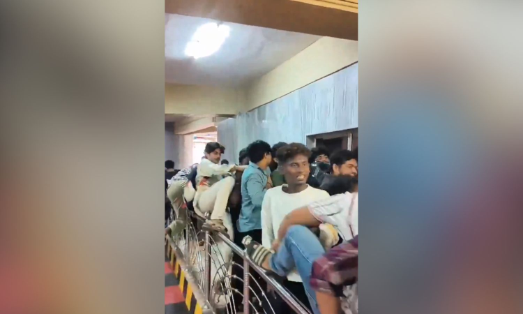 Watch | L2: Empuraan frenzy: Fans climb railing to get tickets for Mohanlal film
