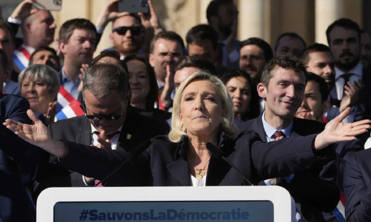Le Pen supporters rally in Paris, turning a protest into a populist show of force
