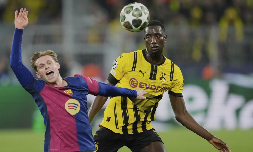 Guirassy hat trick in vain for Dortmund as Barcelona advances to Champions League semis